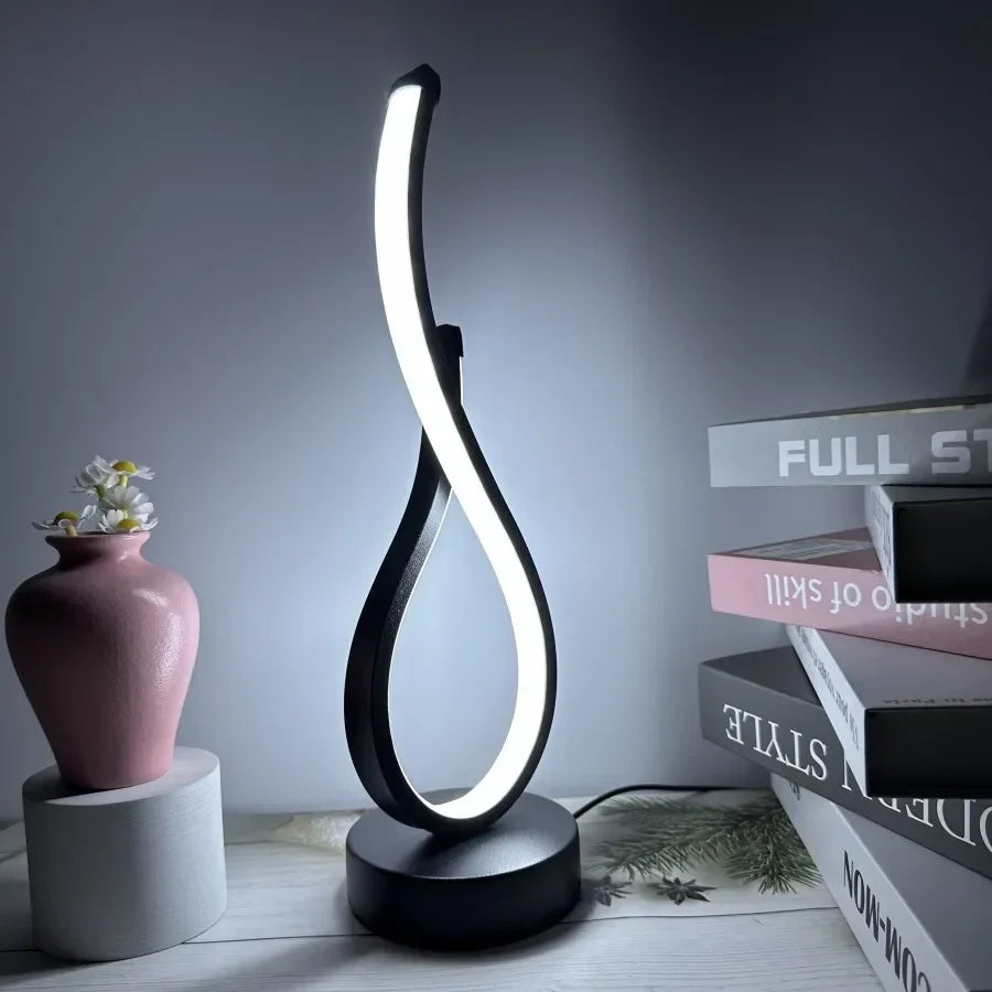 A modern wrought iron table lamp powered by USB - three tone light