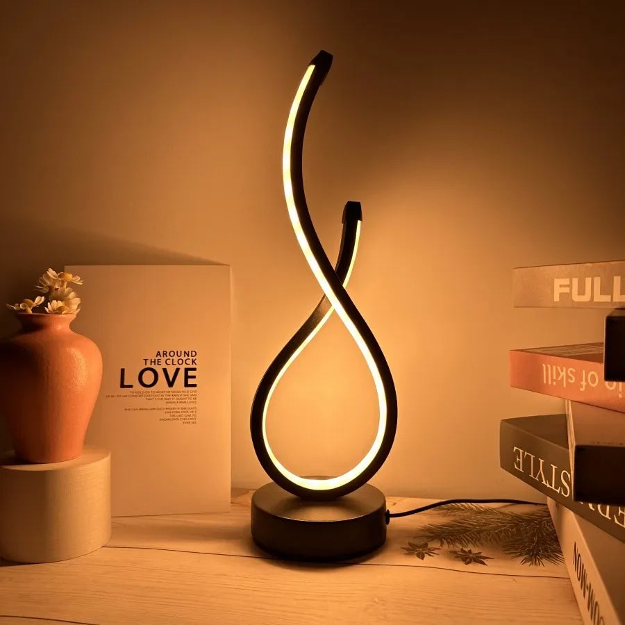 A modern wrought iron table lamp powered by USB - three tone light