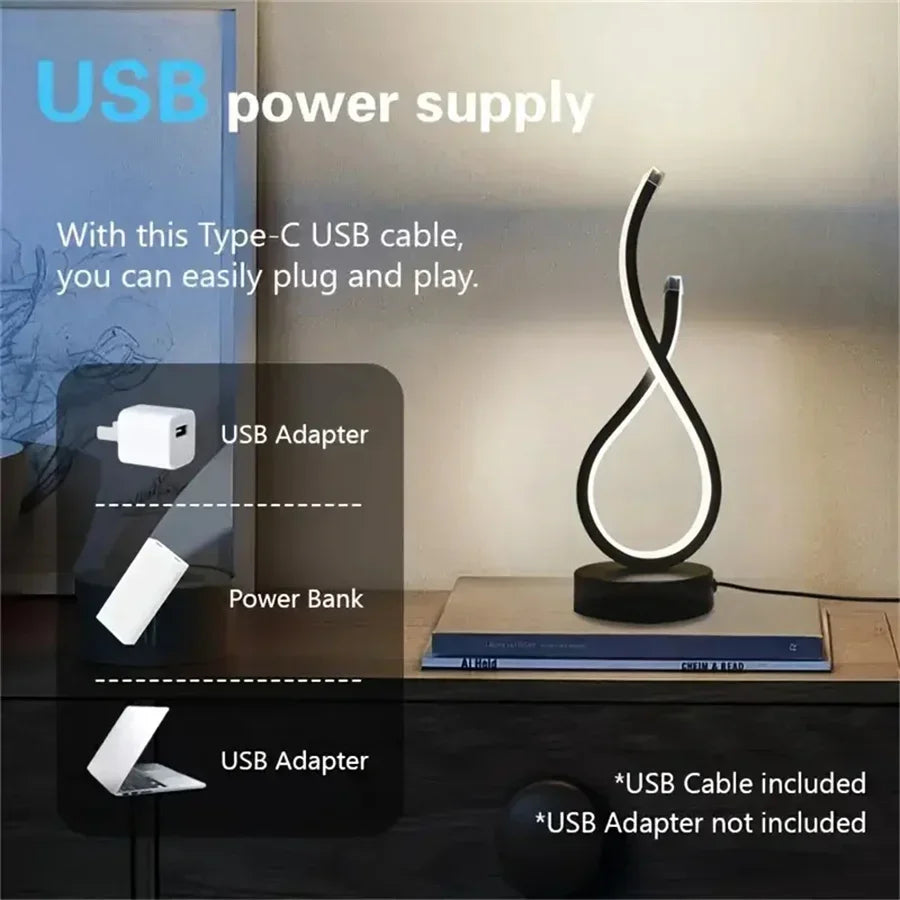 A modern wrought iron table lamp powered by USB - three tone light