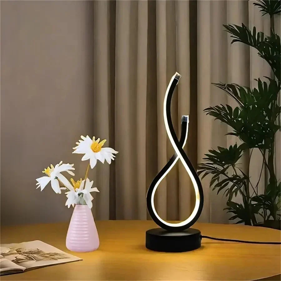 A modern wrought iron table lamp powered by USB - three tone light