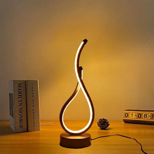 A modern wrought iron table lamp powered by USB - three tone light